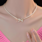 PQT-992 Bow Shape Pearl Pendant Necklace – Elegant Women’s Jewelry in Silver & Gold Finish